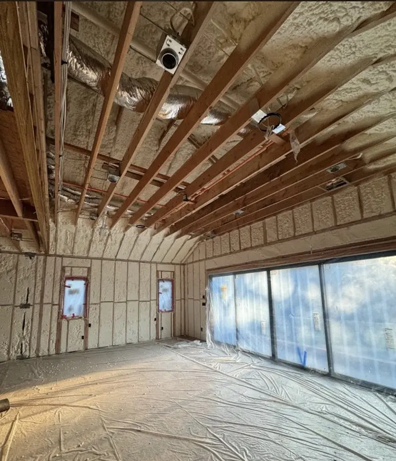Interior walls and ceiling insulated with spray foam during new construction in Warminster